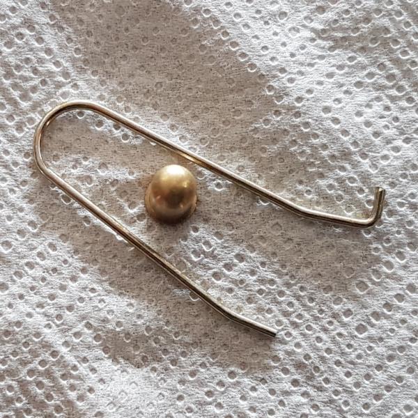 Knopfsicherung mit Feder
